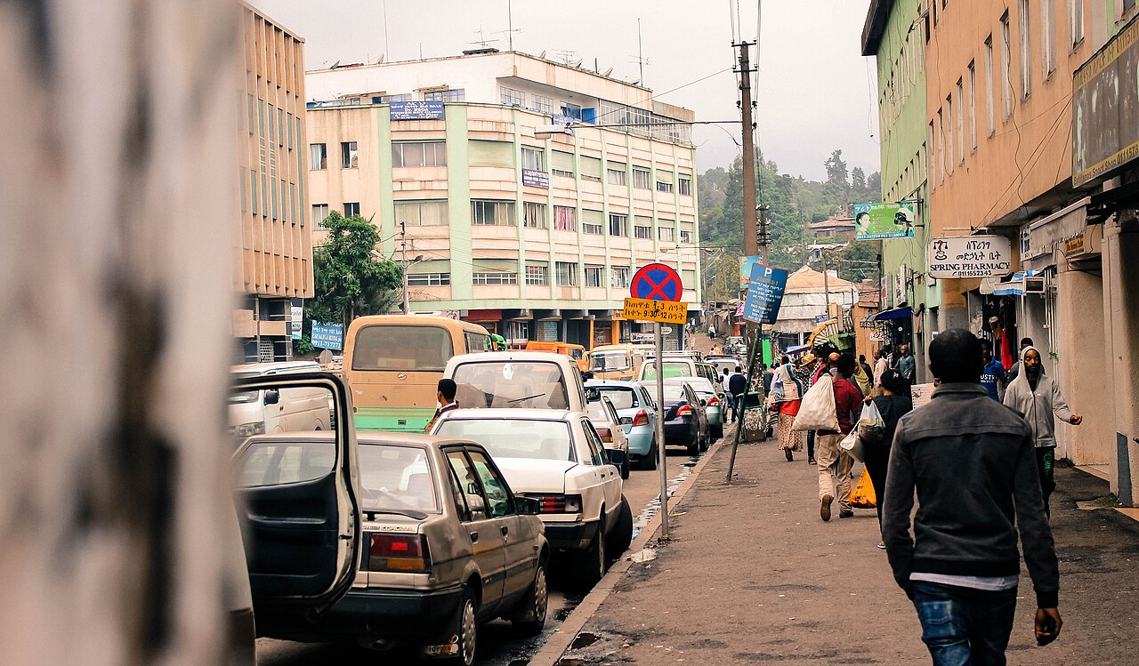 A busy street with pedestrians, shops and traffic in Piassa, Addis Ababa, in 2015
